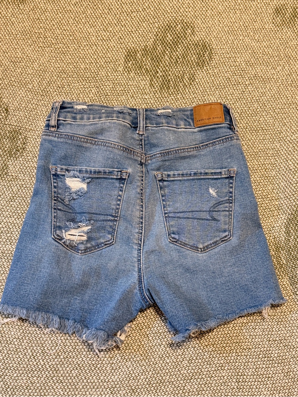 American Eagle Outfitters light blue distressed jean shorts